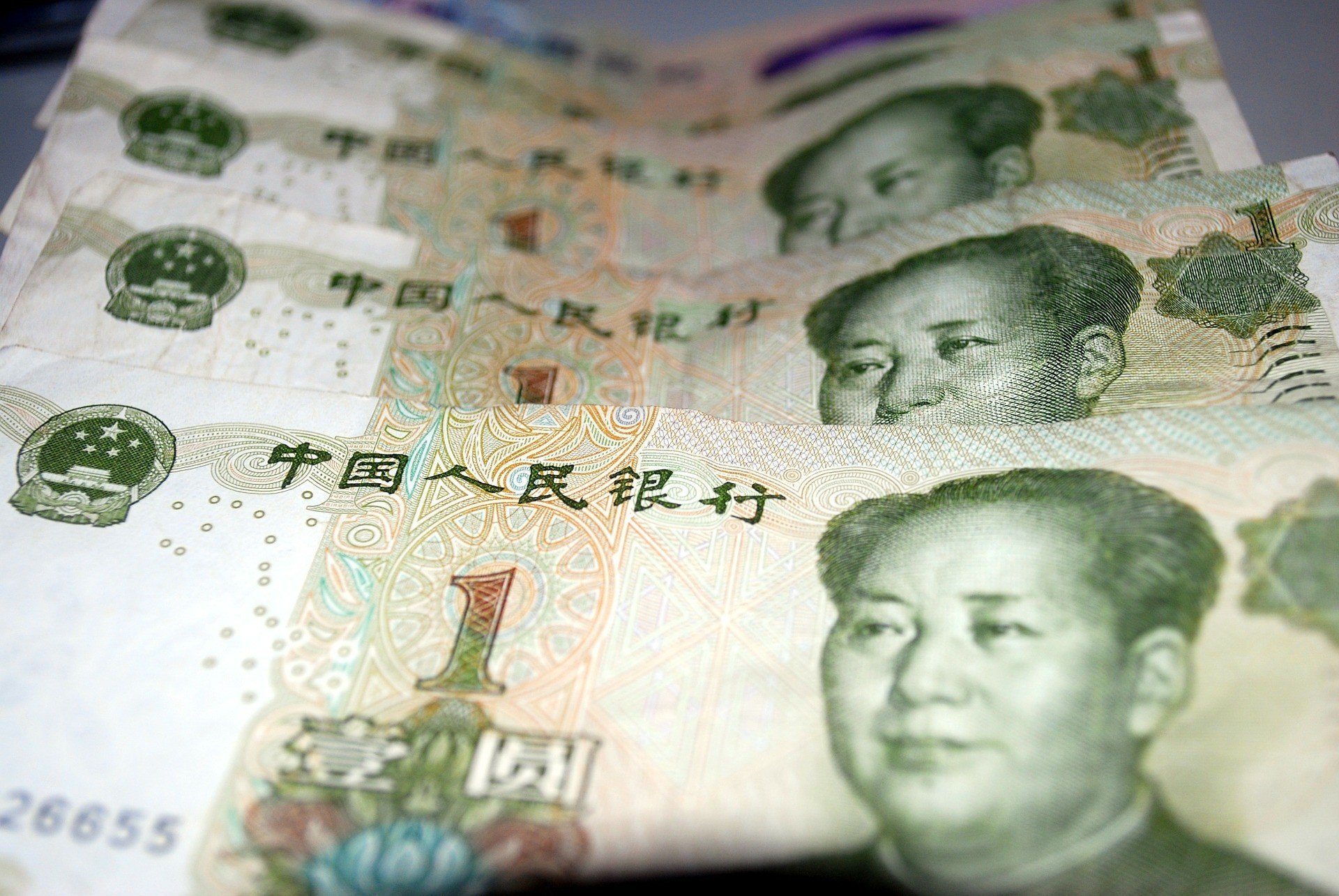 Китай напечатает десятки триллионов юаней
