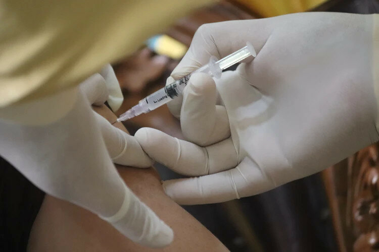 Китай запланировал вакцинировать 40% населения к июню